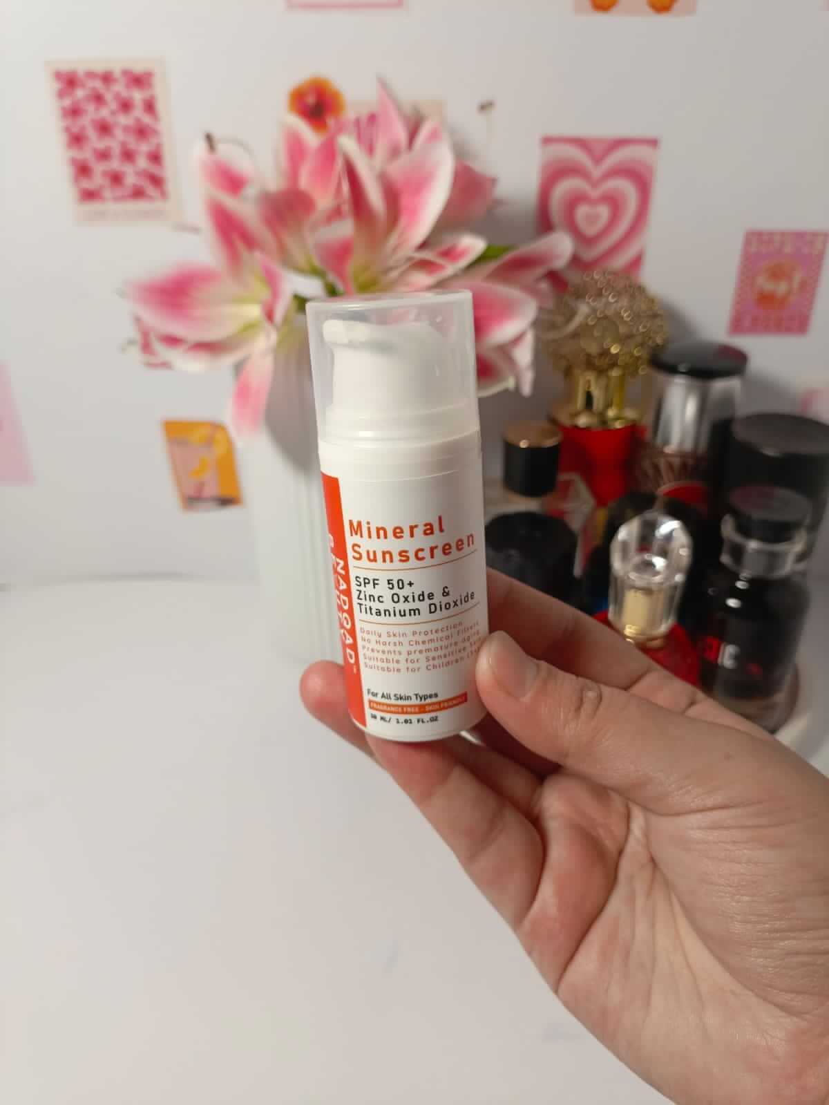 Customer holding Mineral Sunscreen